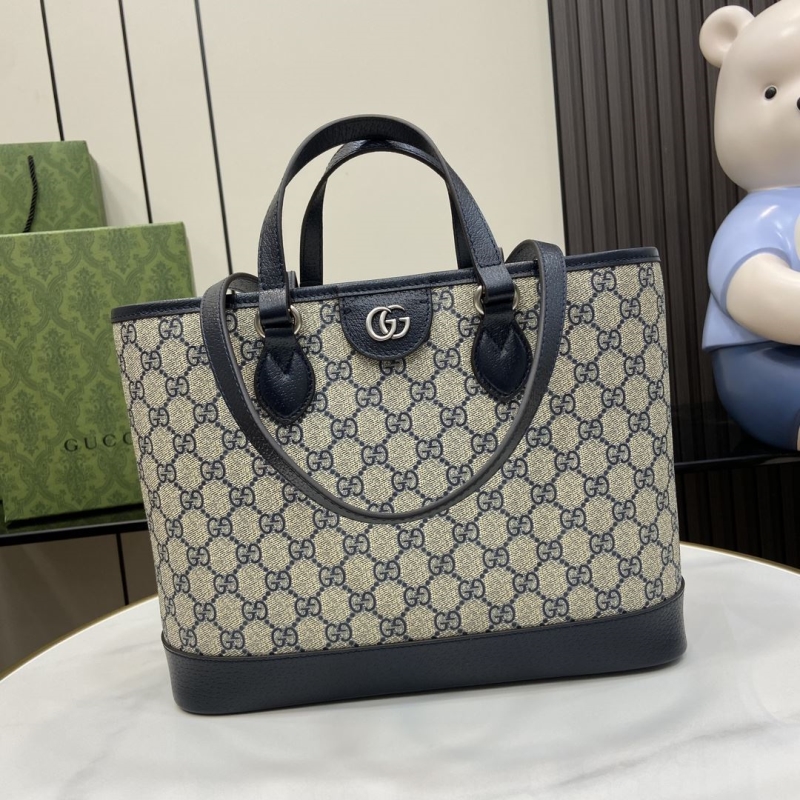G*u*i shopping bags